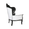 Weißer Sessel und schwarzer Barockstil