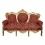 Punainen ja kultainen barokki sohva