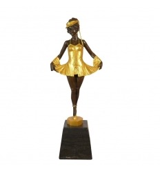 Bronze statue of a young dancer with ballerinas