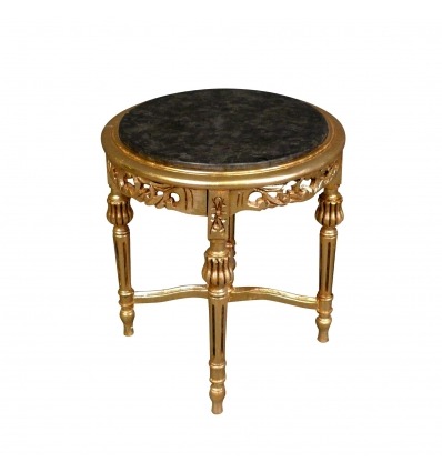 Mesa de apoyo o pequeña mesa barroca en madera dorada redonda.