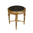 Bolster or small baroque table in round gilded wood