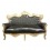 Musta barokki kullattu puinen sohva