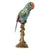 Papegoja med ett målat glas Tiffany lampa