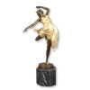 Statue en bronze art déco d'une danseuse à la patine brune et dorée - 