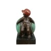 Escultura de bronce - El niño y el béisbol.
