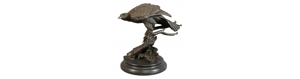 Statue in bronzo di uccelli